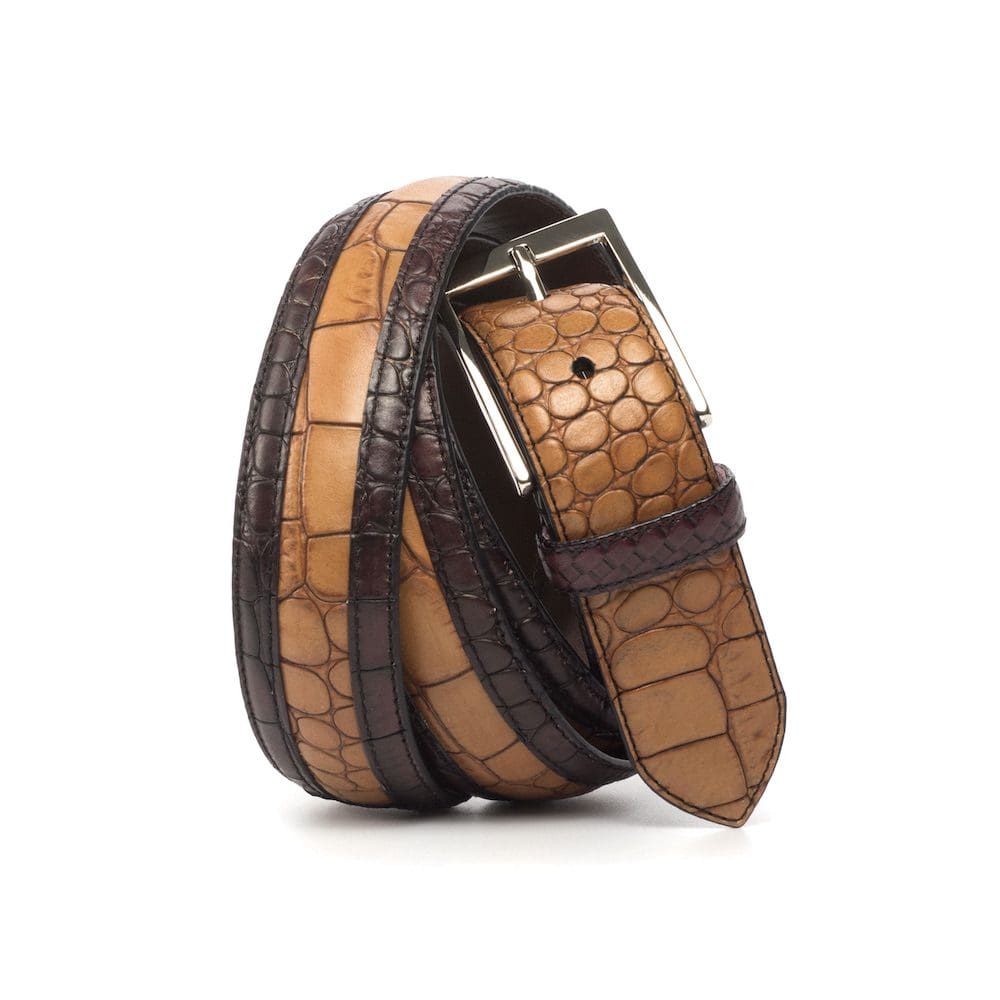 Riem in bruin en cognac croco kalfsleer. Zilveren rechthoekige gesp.