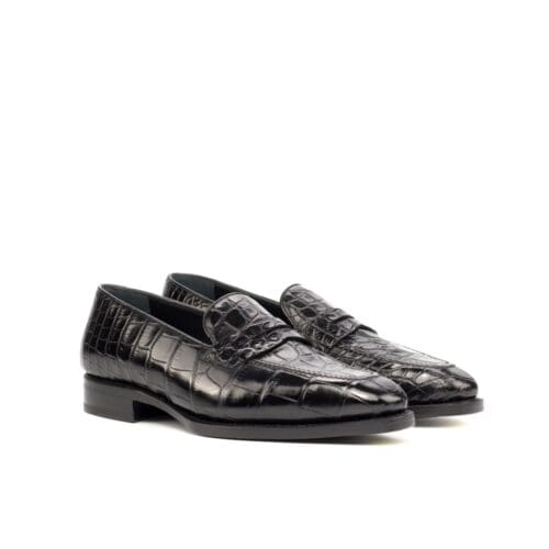 Zwarte loafers in krokodillenleer met fiddle waist.
