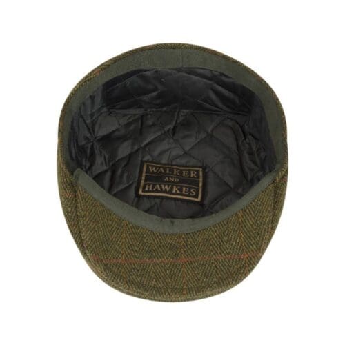 tweed flat cap groen van binnen gefotografeerd