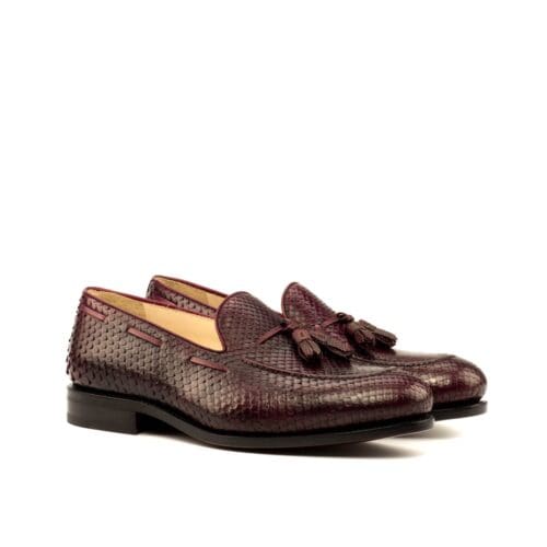 Carnegie loafer in bruin pythonleer met flesjes.